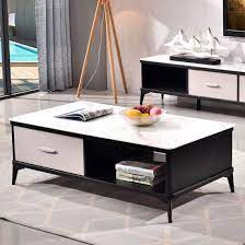 A table with glass top can be a good choice especially if it has a unique and appealing design. China Living Room Furniture New Arrival Good Quality Wood Glass Top Modern Center Table Designer Coffee Table China Glass Top Coffee Table Center Table Modern Coffee