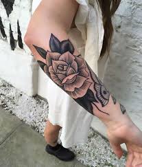 You can choose to combine these tribal tattoos with skulls and bones, angels, flowers, koi fish, or with crosses as shown in the images. 25 Black Rose Tattoo Ideas Sortra