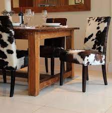 The cowhide dining room furniture are made from strong materials that are highly durable to give you long lifespans. Picture Of Cowhide Dining Chairs Fun And Stylish Choice Of Dining Furniture Dining Room Chairs Dining Chairs Dream Dining Room