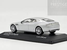 Image result for Titanium Silver 2010 Aston Martin