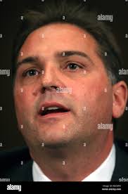 Gerald Putnam, CEO of Archipelago Holdings Inc. and CEO/NYSE John Thain (R)  ring the ceremonial opening trading bell at the Exchange