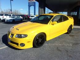 Image result for Yellow 2004 Pontiac