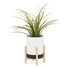 Sélection garantie.nous vous proposons un cache pot en teck, tripode avec décors en laiton. Cache Pot Design Jonea 33cm Blanc Noir