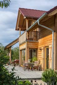 Das Holzhaus Holz 155 Von Frammelsberger R Ingeniuer Holzbau Hat Eine Grosse Terrasse Perfekt Fur Den Sommer Klick A Holzhaus Bauernhaus Aussenbereich Haus