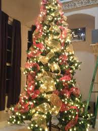 Deco Mesh Christmas Tree Decor In Red And Gold Simple And Elegant Mesh Christmas Tree Red Christmas Tree Christmas Tree With Gifts