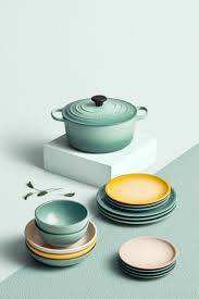The le creuset dutch oven needs little introduction in the market. Le Creuset Round French Oven And Minimalist Dinnerware In Sage Soleil Meringue Tableware Photography Le Creuset Ceramic Dinnerware Set