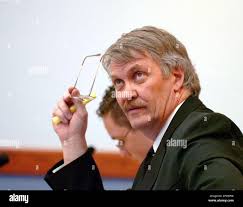 Cody Posey's court-appointed attorney Gary Mitchell listens to his  assistant make a point during the first day of Posey's trial, Tuesday, Jan.  17, 2006, in a courtroom in Alamogordo, N.M. Cody Posey,