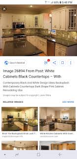 The tile backsplash in our old kitchen was so bad. White Cabinets Black Granite White Cabinets Black Countertops Backsplash Black Cabinets And Countertops