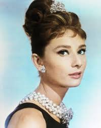 Her bangs have been styled full and messy, which is an easy. How To Audrey Hepburn S Timeless Updo Tutorial Period Hairstyles