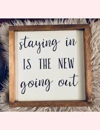 If you're a woodworker, building one doesn't have to break the bank. Staying In Is The New Going Out Farmhouse Style Sign Farmhouse Decor Home Decor Fixer Upp Farmhouse Style Sign New Home Quotes Art Quotes Inspirational