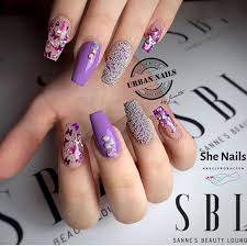 One nail on each hand is also decorated with rhinestones. 60 Pretty Purple Nails The Glossychic