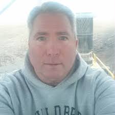 Tree in the middle of the road. Brayton, Iowa