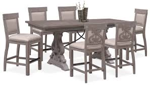 charthouse counter height dining table and 6 upholstered stools