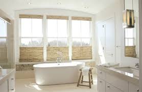 A small contemporary bathroom with a mint tile wall, a wooden vanity and touches of black. 20 Bathroom Windows To Welcome More Natural Light Home Design Lover