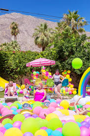 Celebrating tommy's 7th birthday | the tomkat studio blog. An Epic Rainbow Balloon Pool Party Pool Party Decorations Pool Birthday Party Summer Pool Party