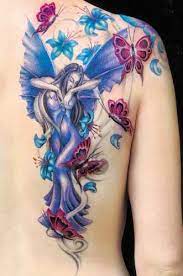 These tattoos would make a nun swear. Beautiful Fairy Tattoo Love Love Love It Fairy Tattoo Fairy Tattoo Designs Fairy Tattoos