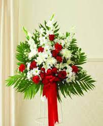 The dry desert climate is not a deterrent for those creating bouquets. Red White Sympathy Standing Basket Avas Flowers
