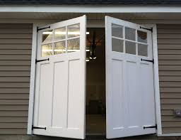 Image result for door within a garage door