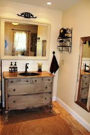 Bathroom Vanity From An Old Dresser The Color Used Is Navajo White By Behr See Website Onfern Bathroom Farmhouse Style Primitive Bathrooms Farmhouse Vanity