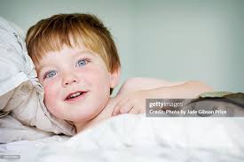 Toddler In Bed High-Res Stock Photo