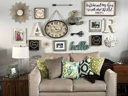 Make your photos colored or black and white to create a unique collage of photos in the corner of your room. Living Room Wall Collage Ideas Novocom Top