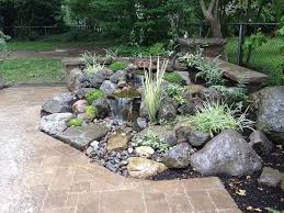 Landscape Garden Design Waterfalls Water Feature Patio Sitting Wall With Pillars Lighting Landscaping Brighton Ny Waterfalls Backyard Backyard Water Feature Water Features In The Garden