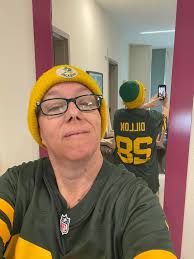 We getting ready ….or I am. It's going to be cold for me…..Wisconsin native  from Hawaii for the game (left)