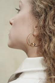 handmade flexi hoops adorned with a round ball flexi hoop means that it is made of a delicate hollow tube that can be moved gently from side to side it berlin