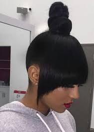 The blunt bangs give this hairstyle a fierce and chic tone. Bun With China Bang