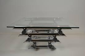 On first glance, this table just looks like a stack of plywood sitting on some cubbies. French Chrome Tubular Stacked Coffee Table 1970s Retro Station