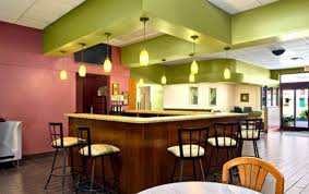 Pass the paddock mall on your right. Ocala Hotels Amenities At Howard Johnson Inn