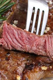 Cross Section View Of A Fork With Piece Of Juicy T Bone Steak Cooked Medium Rare Cooking T Bone Steak Tbone Steak Recipe T Bone Steak