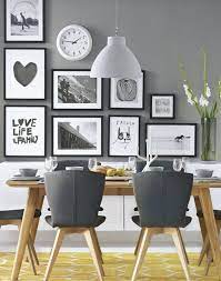 A Novel Way Of Displaying Your Monochrome Prints Which Even Incorporates A Wall Clock Practical Dining Room Small Dining Room Walls Modern Dining Room