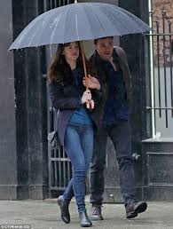 While christian wrestles with his inner demons, anastasia must confront the anger and envy of the women who came before her. Dakota Johnson And Jamie Dornan Go Under Umbrella As They Film Fifty Shades Darker Daily Mail Online