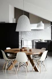 An expandable solid wood dining table is both functional and stylish, while the armless dining chairs include comfortable cushions and neutral colors that will go with any decor. Pin By Danielle Ursem On Interiors Round Dining Table Modern Round Dining Room Modern Dining Room