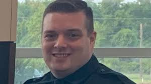 One dead, police looking for two more in shooting of Broken Arrow officer