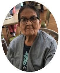 Ramona Delilah (Apple) Ashmore “Cánté enta Waunsila Wìn” October 30, 1938 ~  August 26, 2025 Ramona 'Tiny Babe' Apple-Ashmore was born at home at No  Flesh community, near Kyle to Joseph Apple