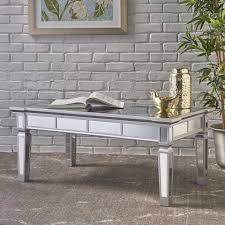 The table base features an intricate design, one that you will admire more and more every day. Solanna Rectangle Mirror Coffee Table By Christopher Knight Home Overstock 18599518