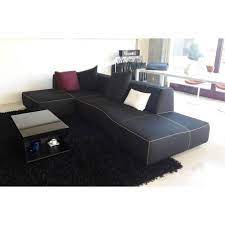 It seems a monolith that has been shaped by subtraction, rounded and moulded by the designer. Bend Sofa B B Italia