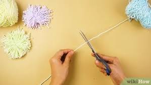 3 Manieres De Fabriquer Un Pompon En Laine Wikihow