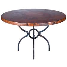 Designing or even handily refurbishing your copper top dining room tables can be as easy as a mosey in the park or it might be a no question intricate job. Logan Iron Dining Table With 48 Round Hammered Copper Top
