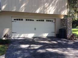Mid America Regal Carriage Style Garage Door With Windows And Decorative Hinges Carriage Style Garage Doors Garage Doors Garage Door Windows