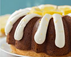 Beat butter and sugar with an electric mixer in a large bowl until light and fluffy. Lemon Bundt Cake With Cream Cheese Frosting Lil Luna