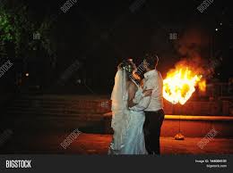 Wedding photo fire in background. Wedding Couple Image Photo Free Trial Bigstock