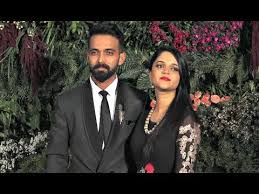 Ajinklya rahane's former teammate harbhajan singh tweeted, congratulations new daddy in town updated: Ajinkya Rahane With Wife Radhika Dhopavkar At Virat Anushka Reception Mumbai Youtube