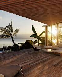 Dramatic lines and unusual rooflines catch your eye right away in this unique design sold exclusively through us.the floor plan is simple and open for sweeping views.a second floor sun deck off the family room is an added bonus.a quiet reading nook can also be found on the second floor. Modern Beach House Design Comelite Architecture Structure And Interior Design Archello