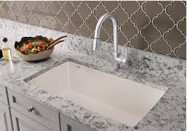 That is a porcelain kitchen sink that's been undermounted to a laminate counter. Best Undermount Kitchen Sinks 2021 List Of Sinks That Doesn T Suck