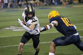 Whitmer grinds down Jackets, 25-15