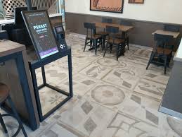 Its menu features a selection of tacos, burritos, gorditas, quesadillas, chalupas, taquitos, nachos and various platters. Taco Bell New Philadelphia Ohio Classic Tileworks