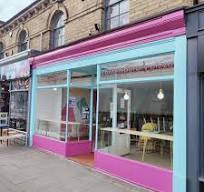 Newly restored and repainted shop front with reverse painted ...